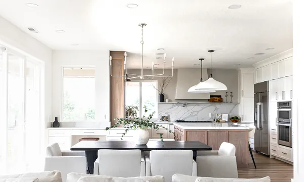 White kitchen and dining room remodeled by JDI Construction