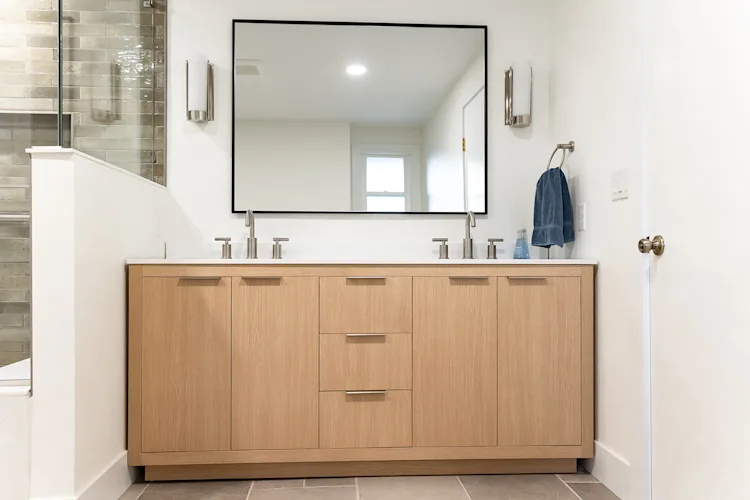 Three-bathroom remodel with white oak vanities in Battle Ground, WA